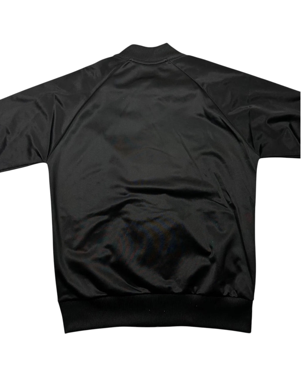 GEGENHALT. Fred Perry Argyle Track Jacket, schwarz, Polyester, mit durchgehendem Reißverschluss und Rippstrickbündchen.